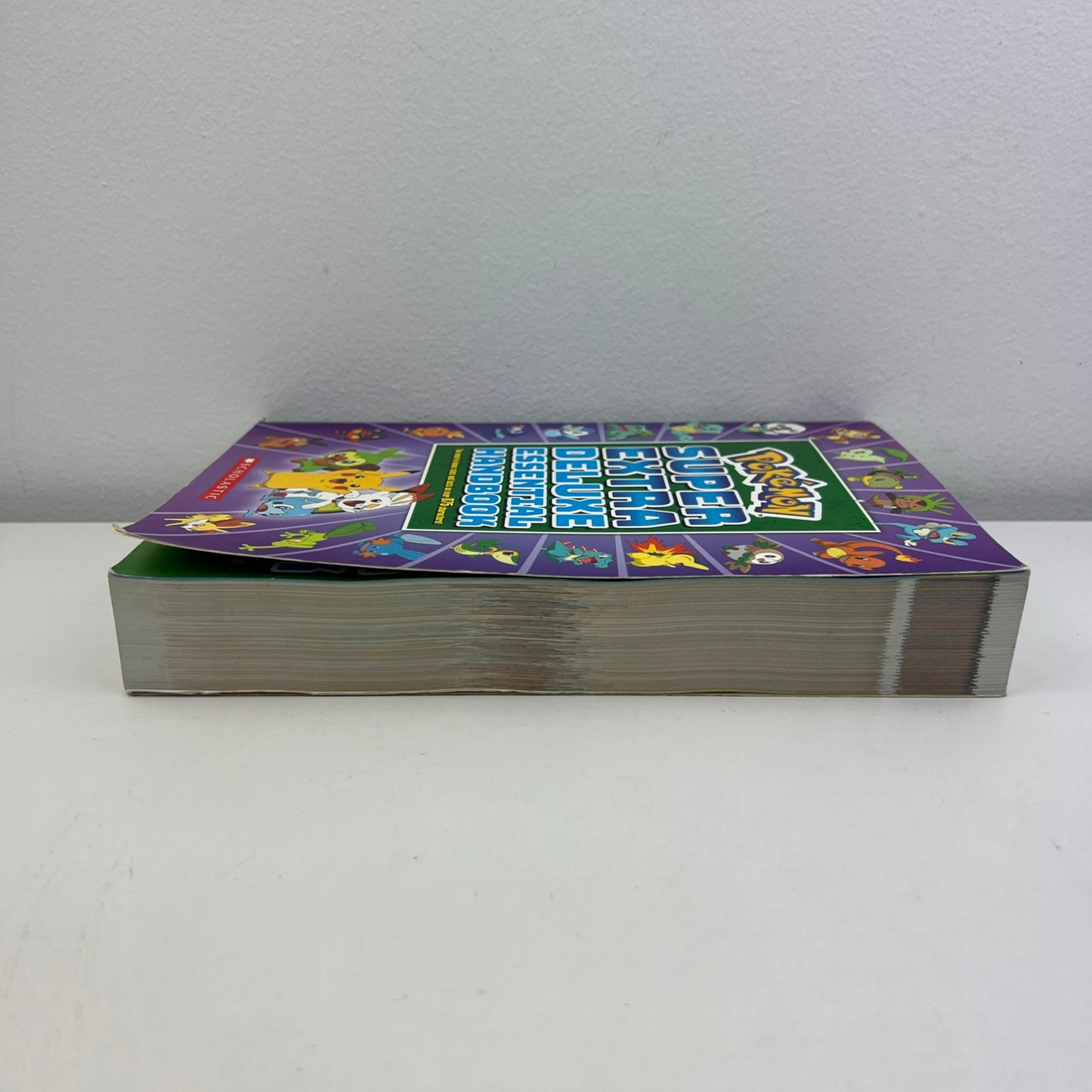 Pokémon Super Extra Deluxe Essential Handbook Paperback Book