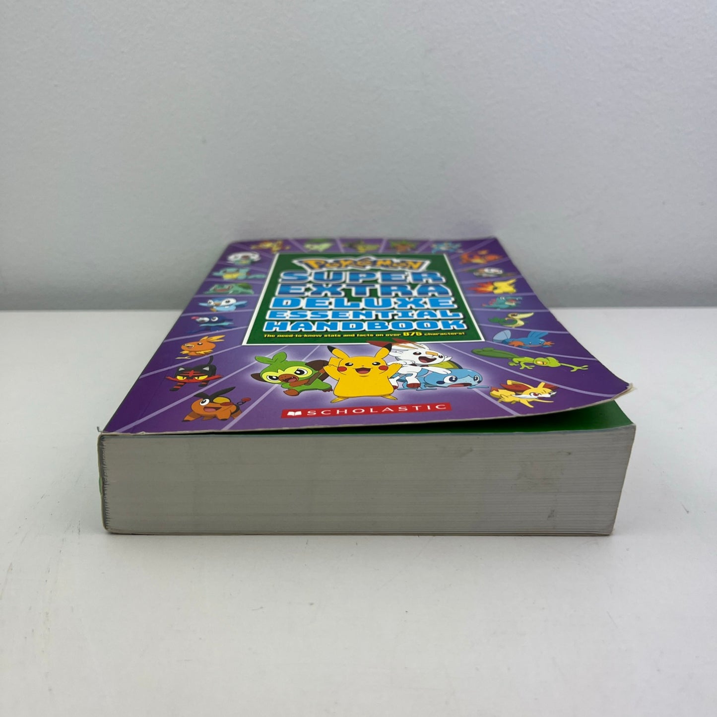 Pokémon Super Extra Deluxe Essential Handbook Paperback Book