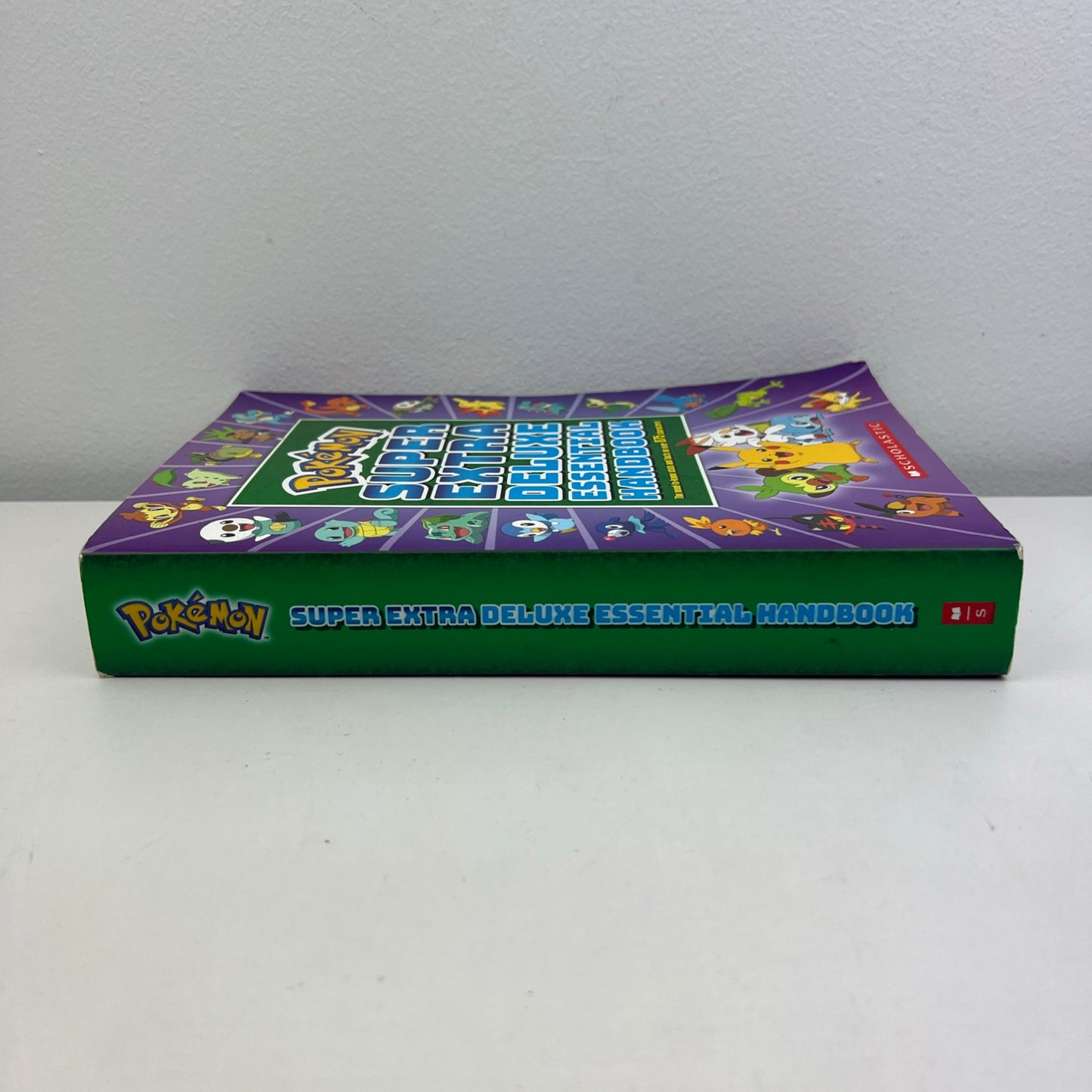 Pokémon Super Extra Deluxe Essential Handbook Paperback Book