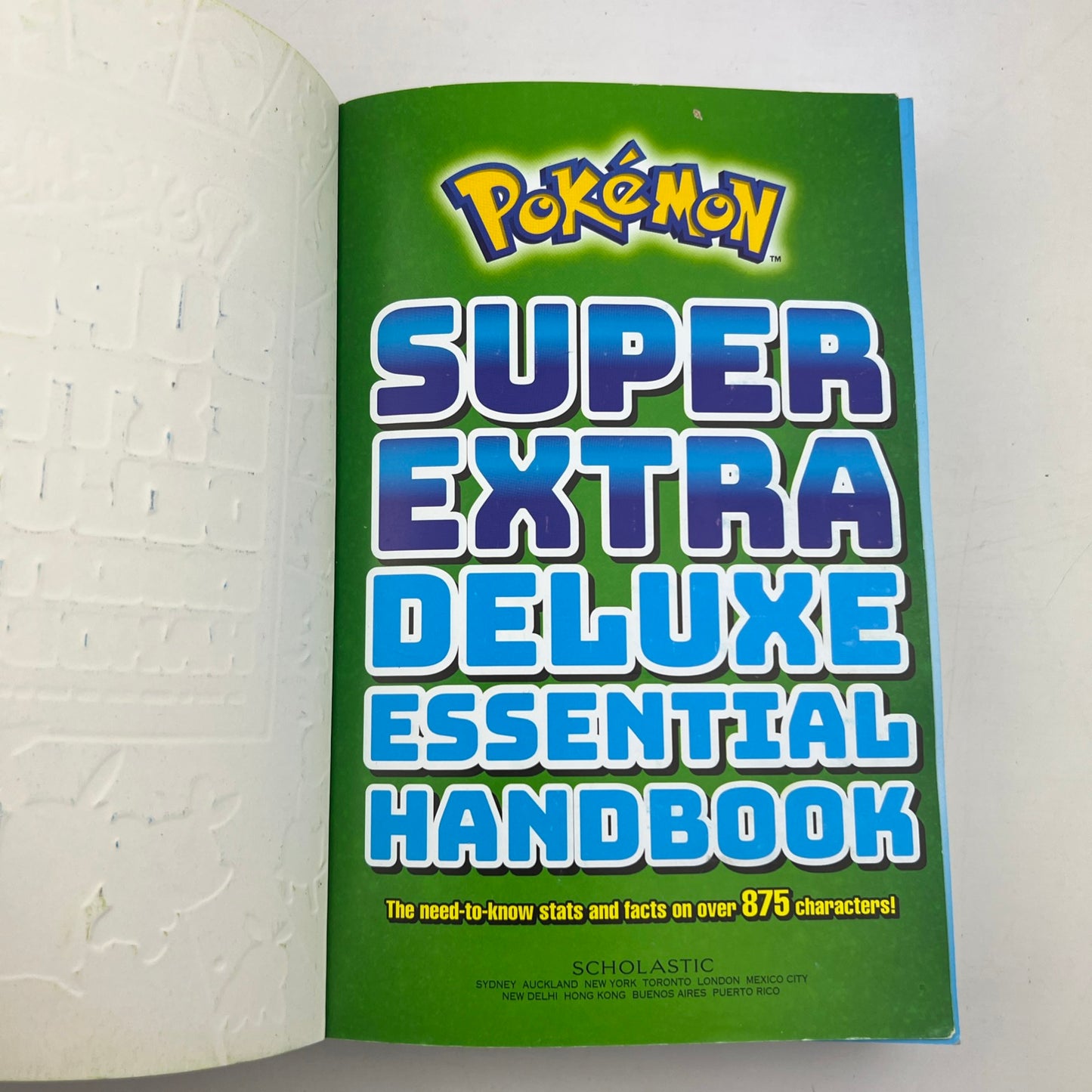Pokémon Super Extra Deluxe Essential Handbook Paperback Book
